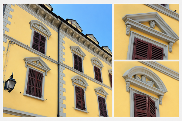 Facciata di un edificio storico con cornici, frontoni e modanature decorative che possono essere preservati grazie a un isolamento termico a basso spessore.
